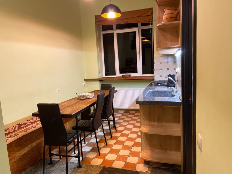 Kitchen or kitchenette, Living room, Seating area, Dining area, stove, toaster
