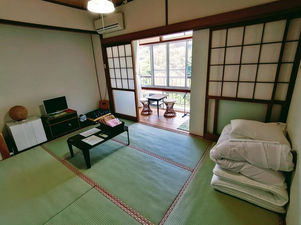 Bed, Living room, Seating area, Bedroom, towels