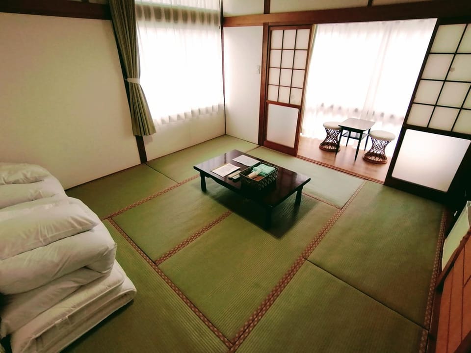 Bed, Living room, Seating area, Bedroom, towels
