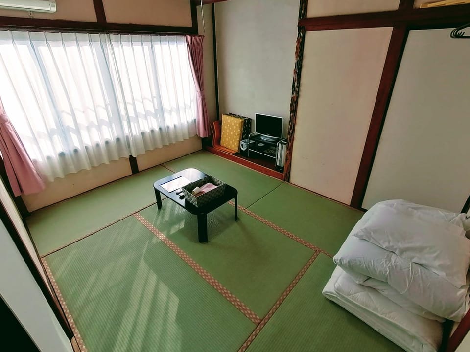 Bed, Living room, Seating area, Bedroom, towels