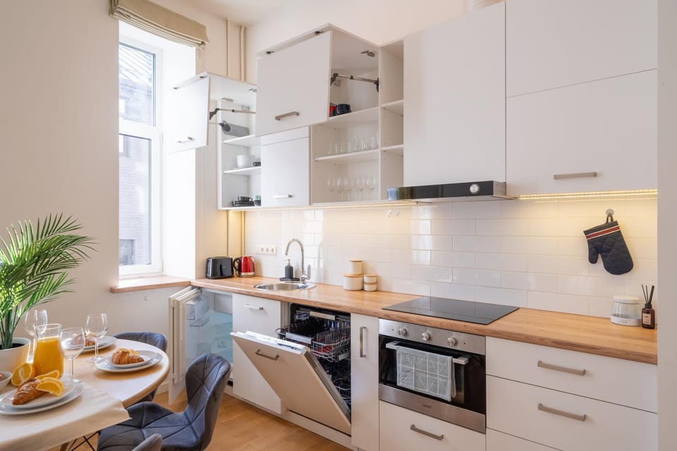 Kitchen or kitchenette, dishwasher, oven, stove, toaster