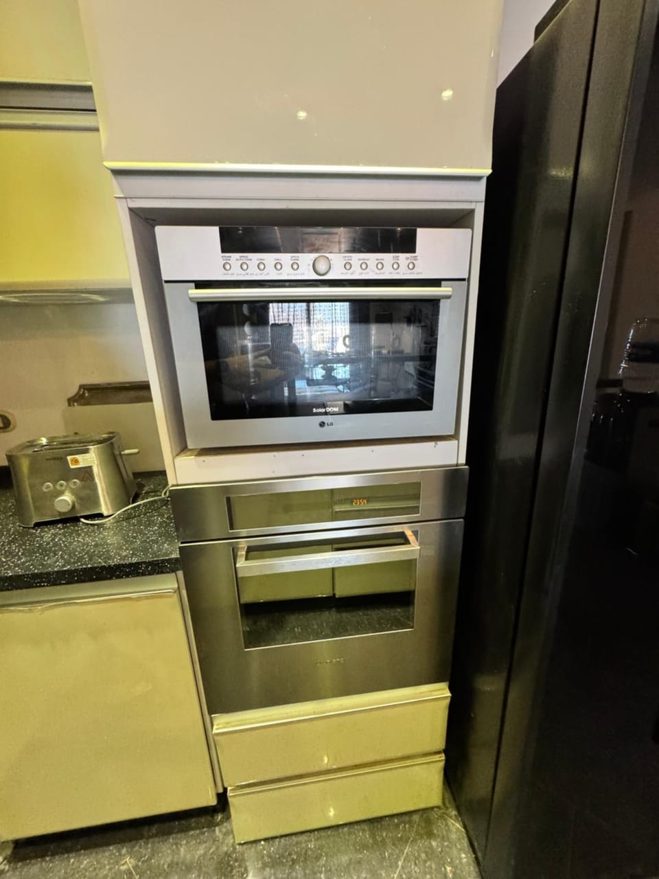Kitchen or kitchenette, microwave, oven