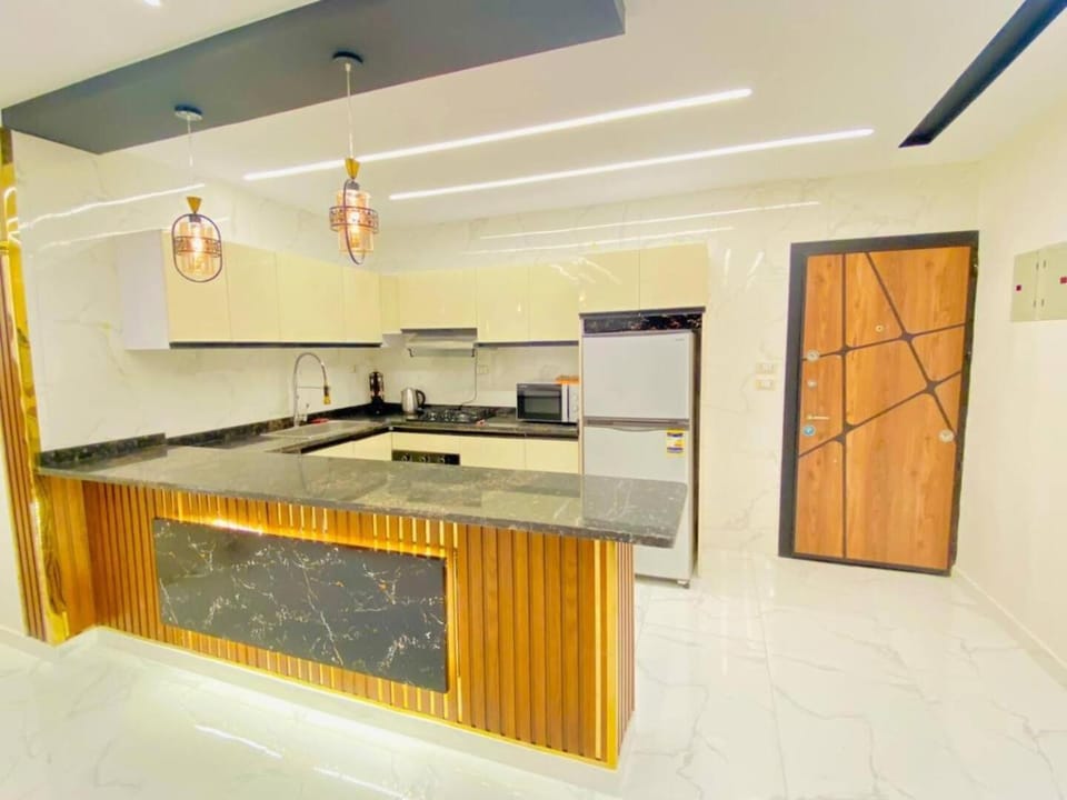 Kitchen or kitchenette, oven, stove