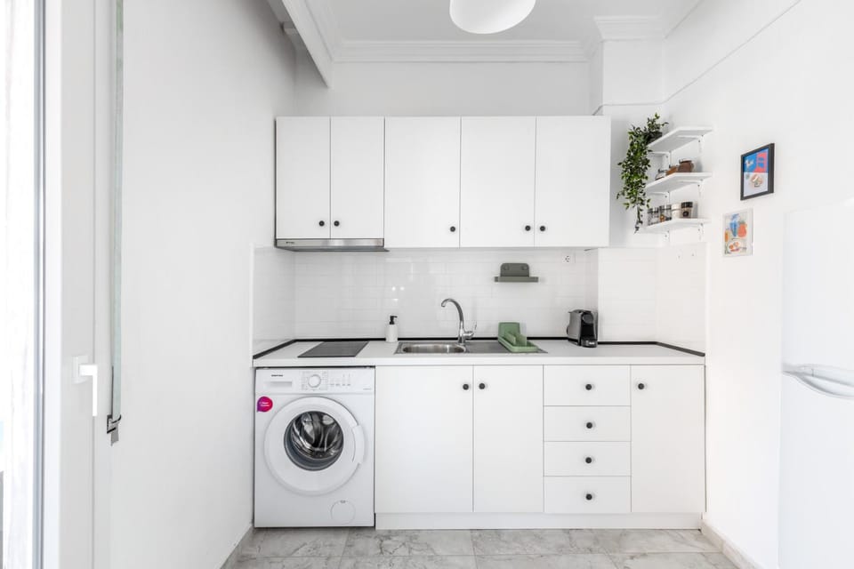 Kitchen or kitchenette, washing machine