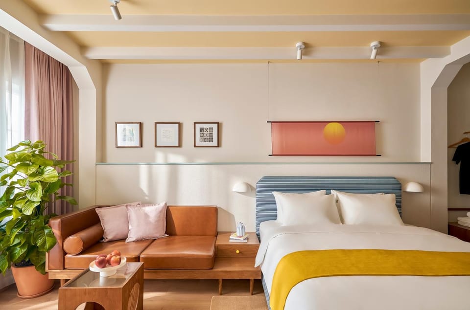 Bed, Living room, Seating area, Bedroom