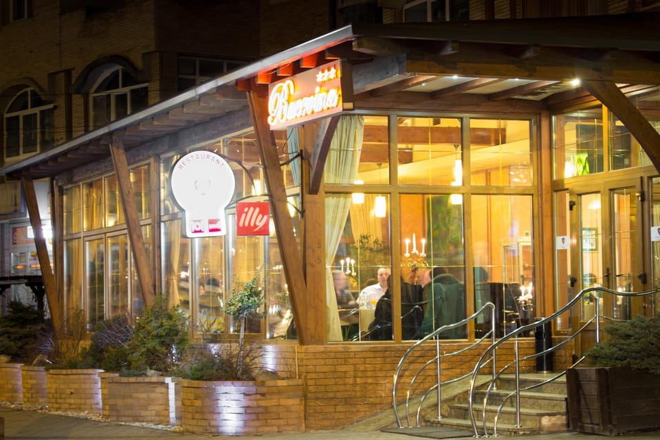 Restaurant/places to eat, Facade/entrance, Night, Property logo or sign, Summer, Lounge or bar, Meeting/conference room