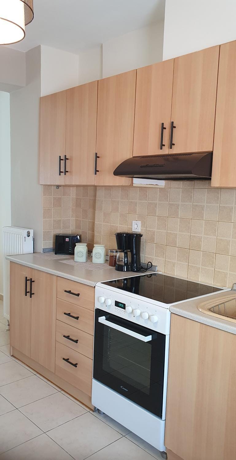 Kitchen or kitchenette, stove, toaster