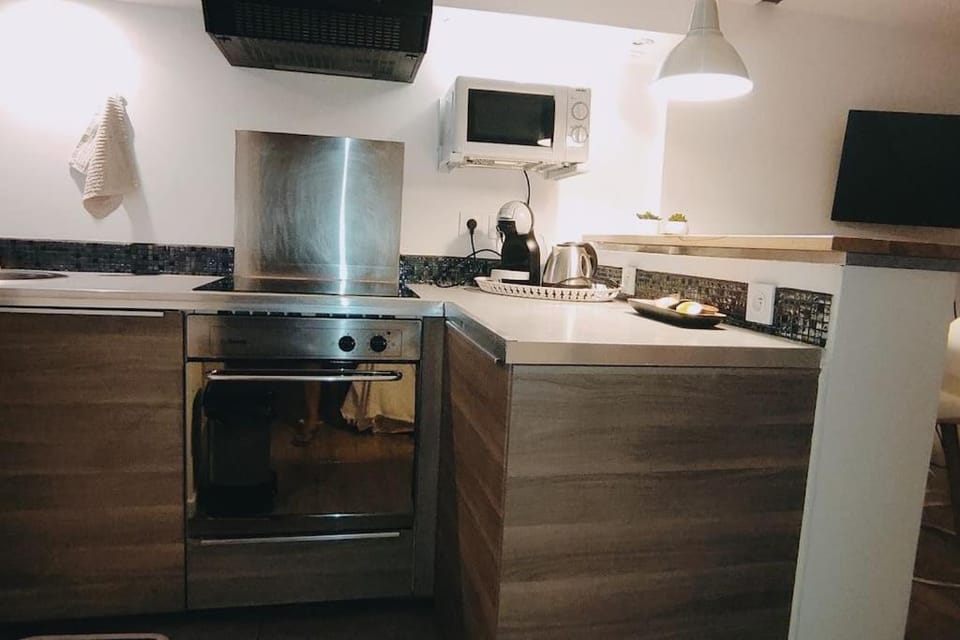 Kitchen or kitchenette, oven, stove