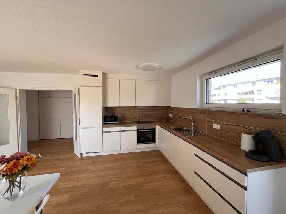 Kitchen or kitchenette, dishwasher, oven, stove, toaster