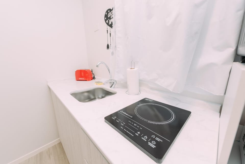 Kitchen or kitchenette, stove
