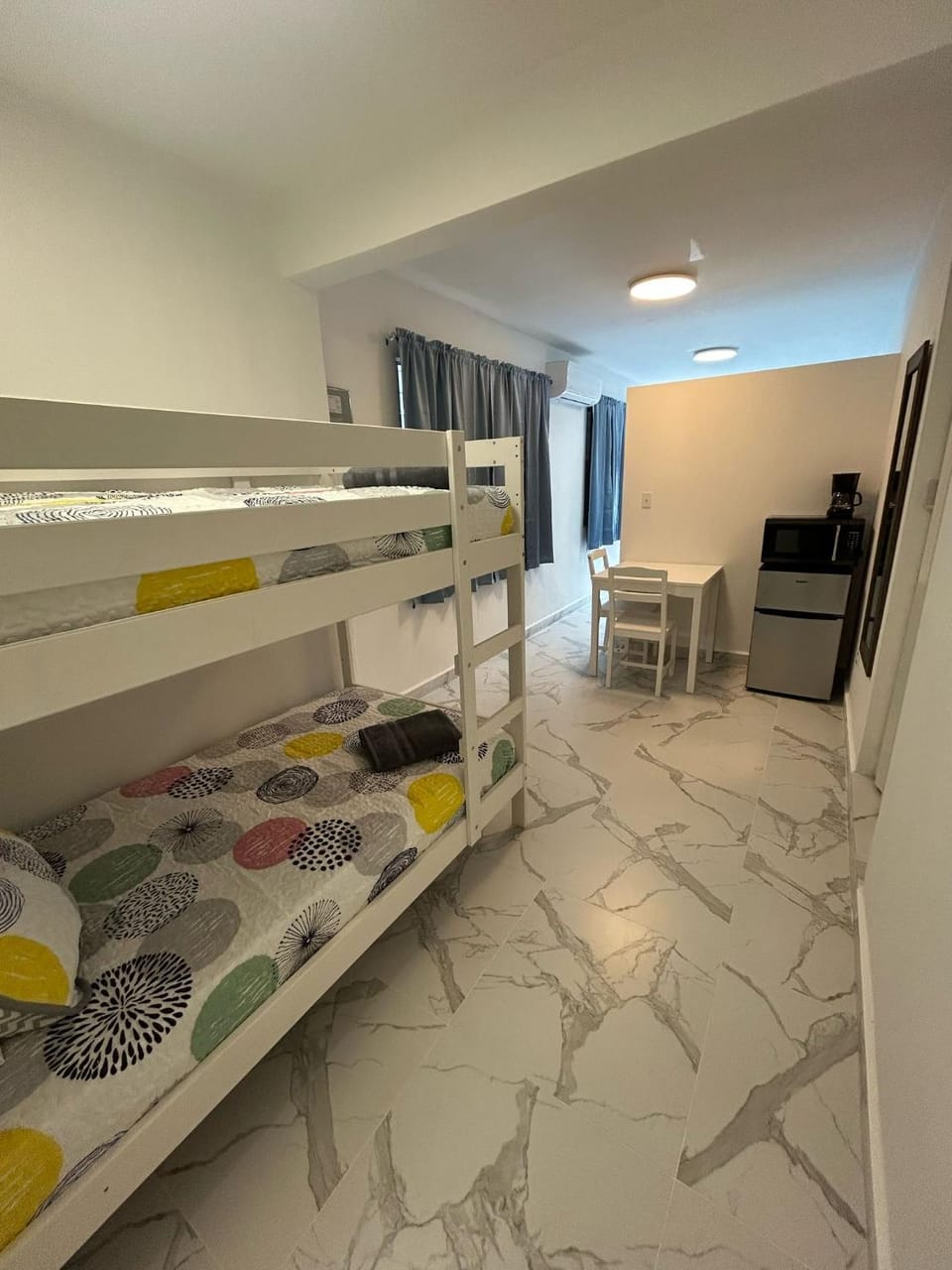 Photo of the whole room, Bedroom, bunk bed, microwave