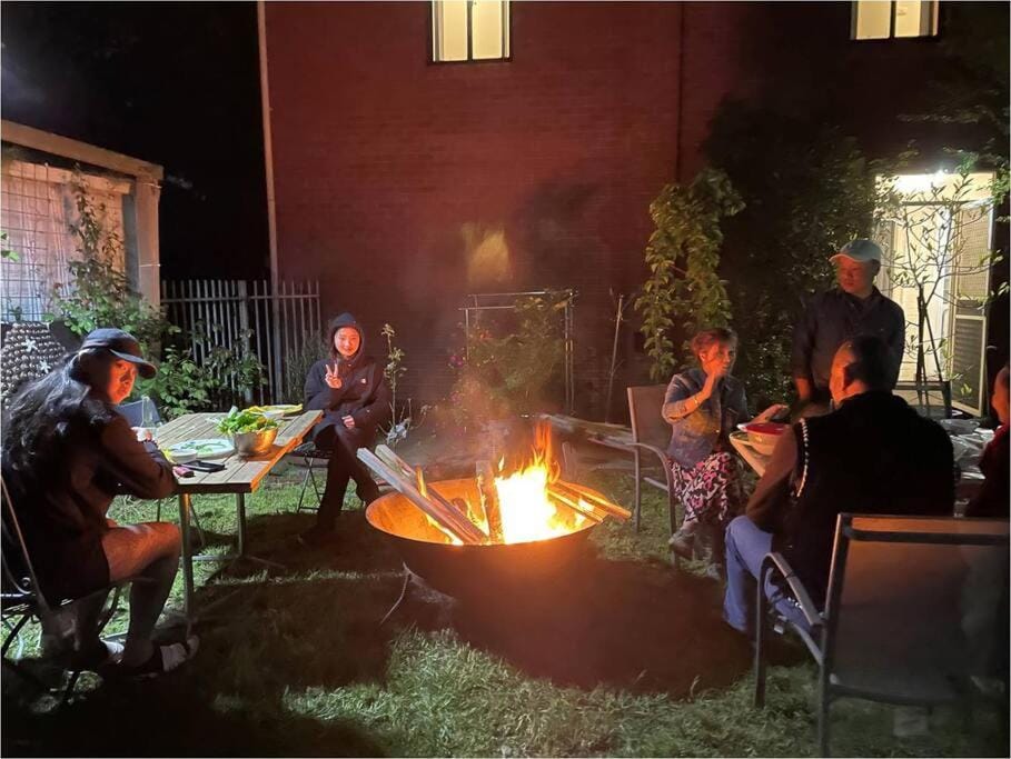 group of guests, fireplace