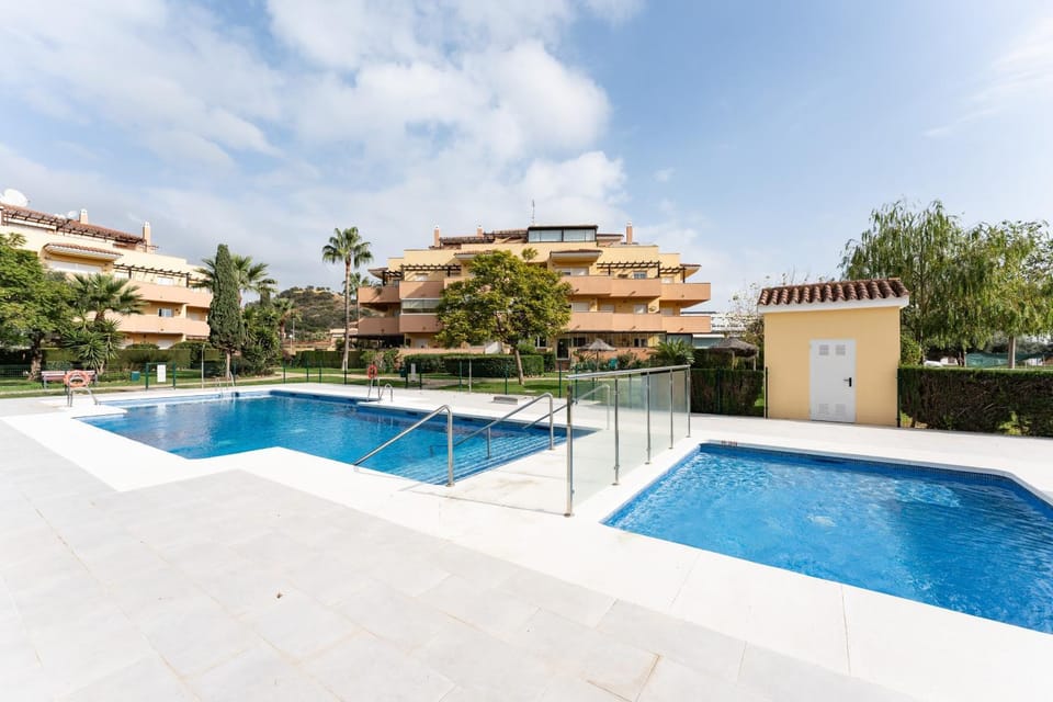 Property building, Living room, Swimming pool