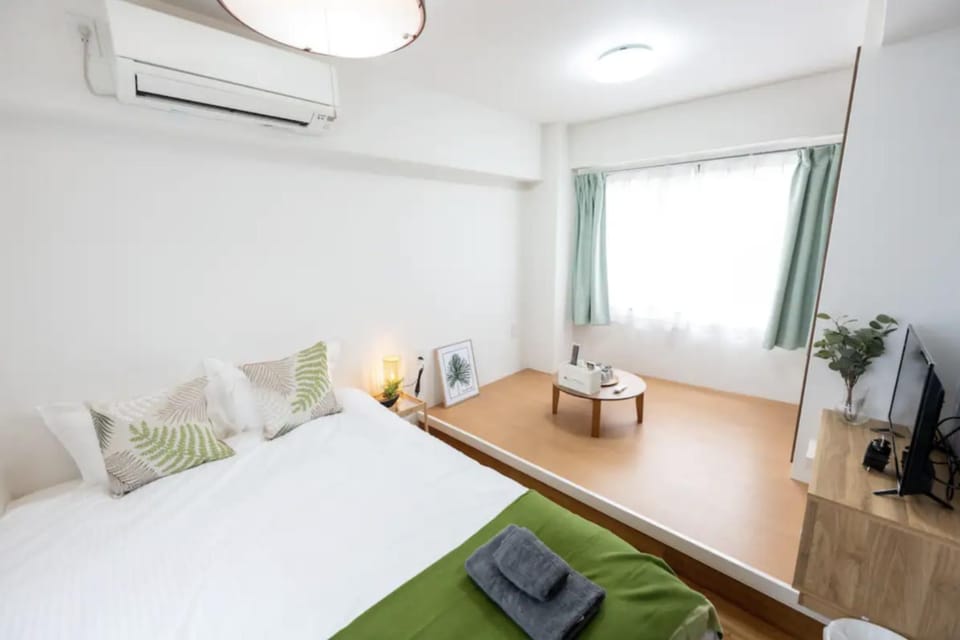 Bed, Photo of the whole room, Bedroom, towels, air conditioner