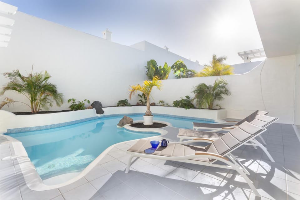 Property building, Living room, Swimming pool