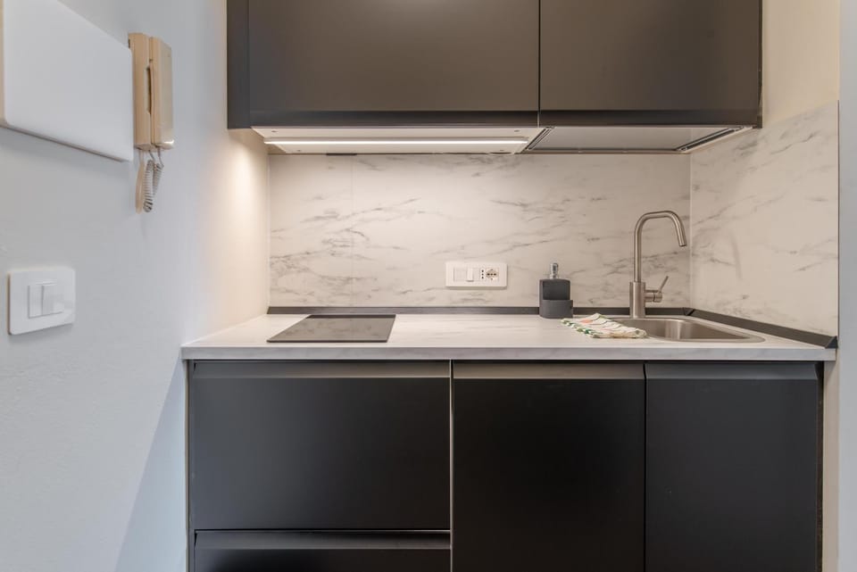 Kitchen or kitchenette, stove