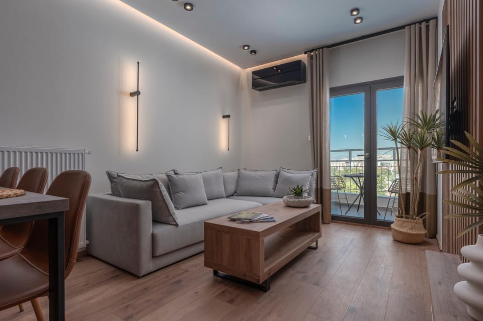 View (from property/room), Balcony/Terrace, Living room, Seating area, City view, Landmark view, Mountain view, air conditioner