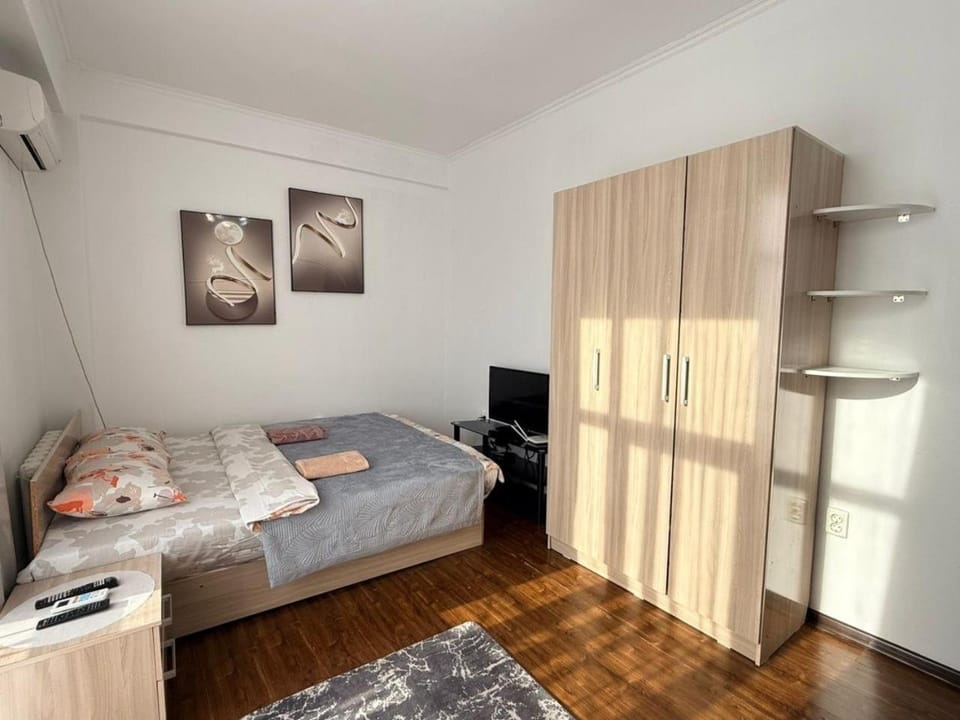 Bed, TV and multimedia, Bedroom, towels, wardrobe, air conditioner