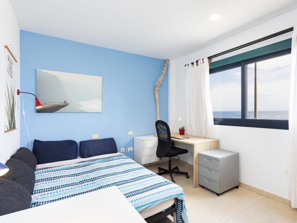 Bed, Seating area, Bedroom, Sea view