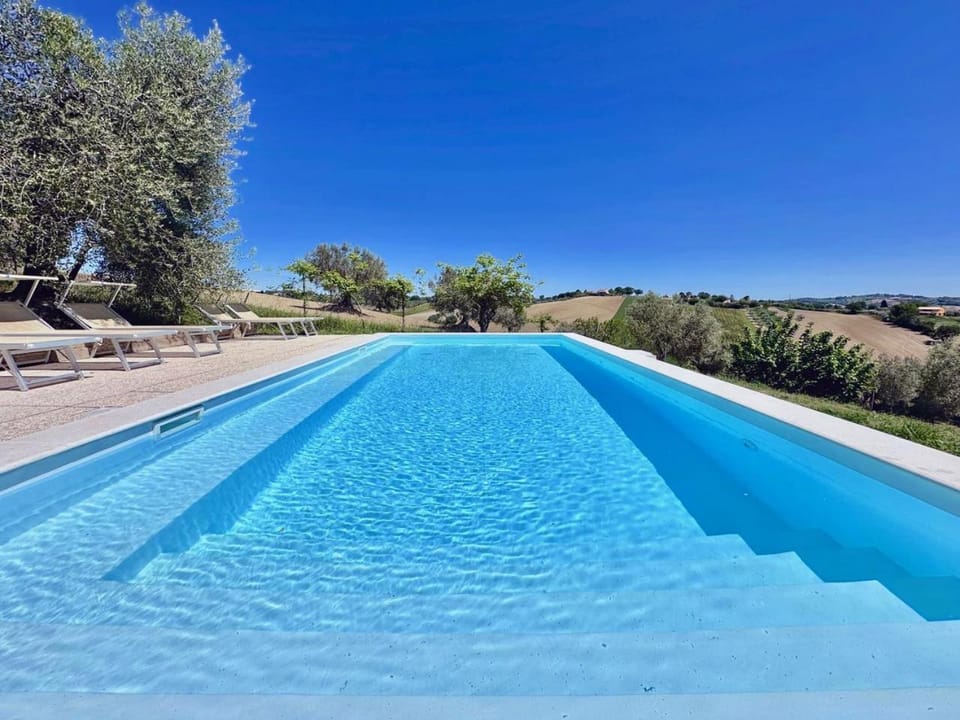 Where Ancient Charm Meets Poolside Bliss Apartment in Senigallia