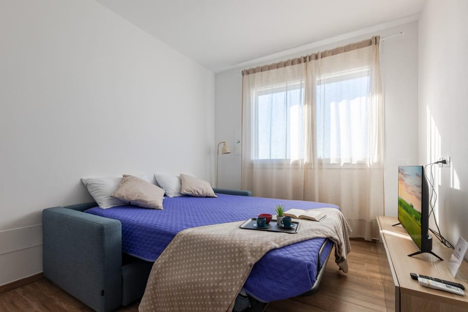 Bed, TV and multimedia