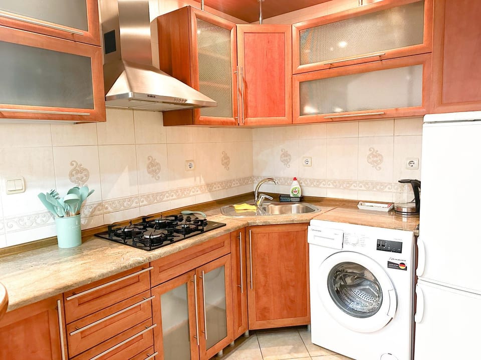 Kitchen or kitchenette, washing machine