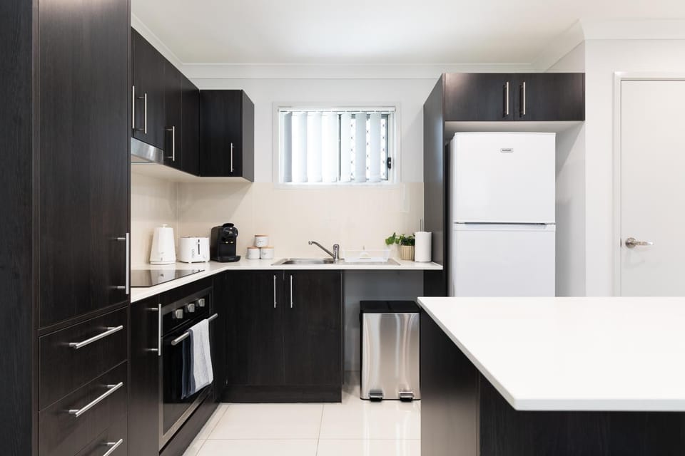 Kitchen or kitchenette, oven, stove, toaster