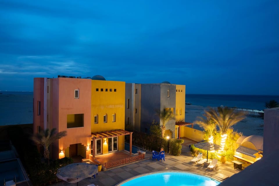 Property building, Night, Natural landscape, Pool view, Sea view, Swimming pool, sunbed