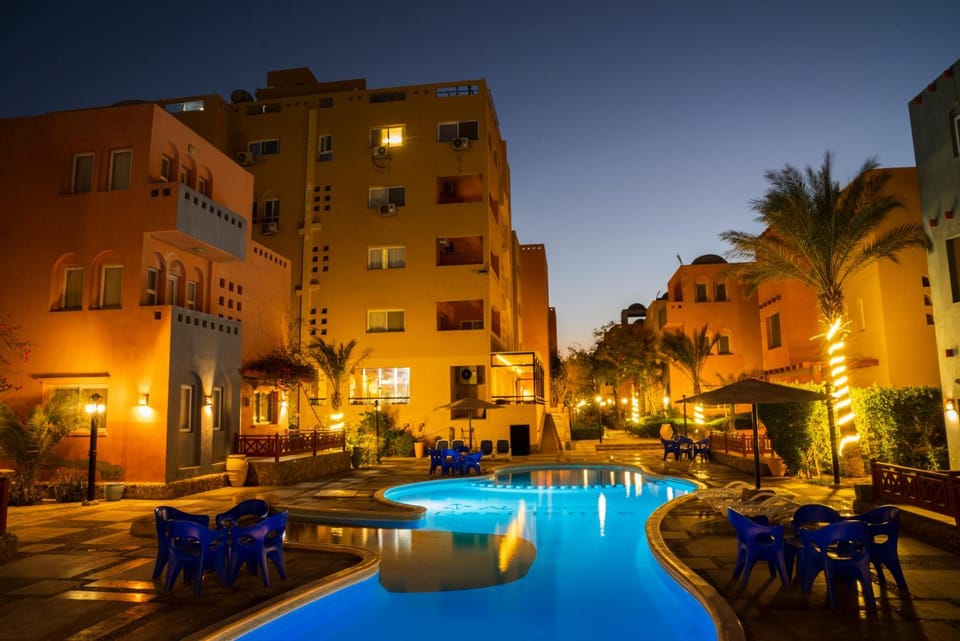 Property building, Patio, Day, Night, Pool view, Swimming pool, Location, sunbed