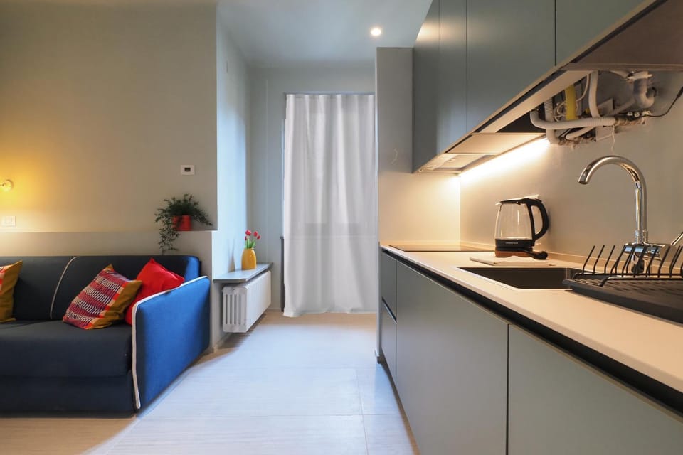 Kitchen or kitchenette, Living room, Seating area, stove
