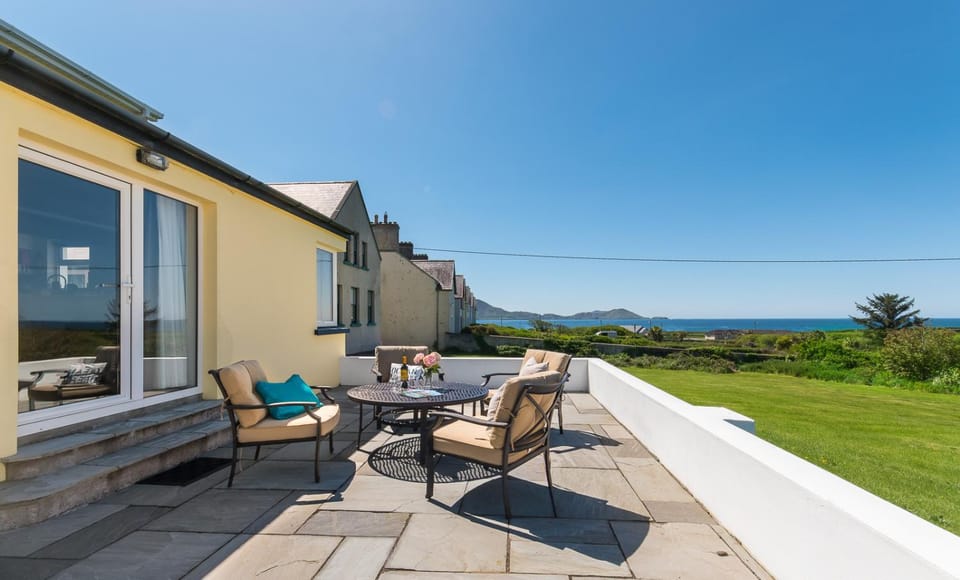 Property building, Patio, Natural landscape, View (from property/room), Seating area, Sea view
