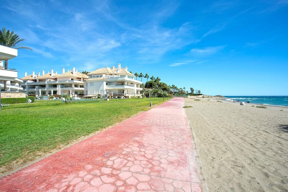 Property building, Nearby landmark, Day, Natural landscape, Beach, Sea view