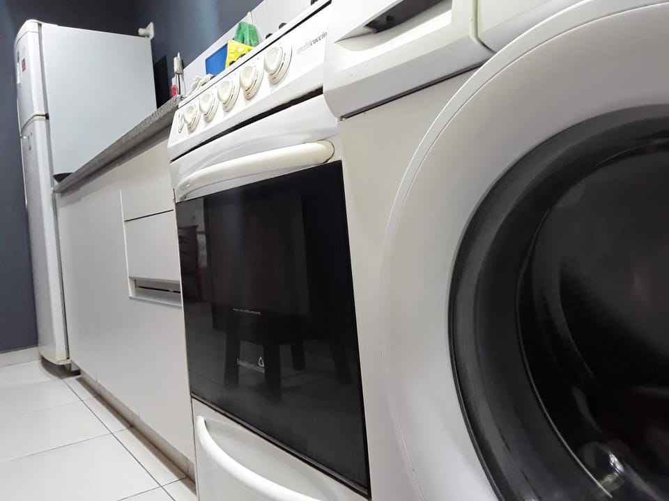Kitchen or kitchenette, washing machine