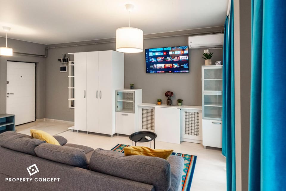 Communal lounge/ TV room, Kitchen or kitchenette, Living room, Seating area, Evening entertainment, oven, wardrobe, air conditioner