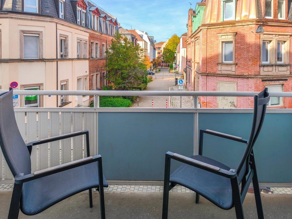 Property building, Facade/entrance, Day, View (from property/room), Balcony/Terrace, Seating area, Landmark view