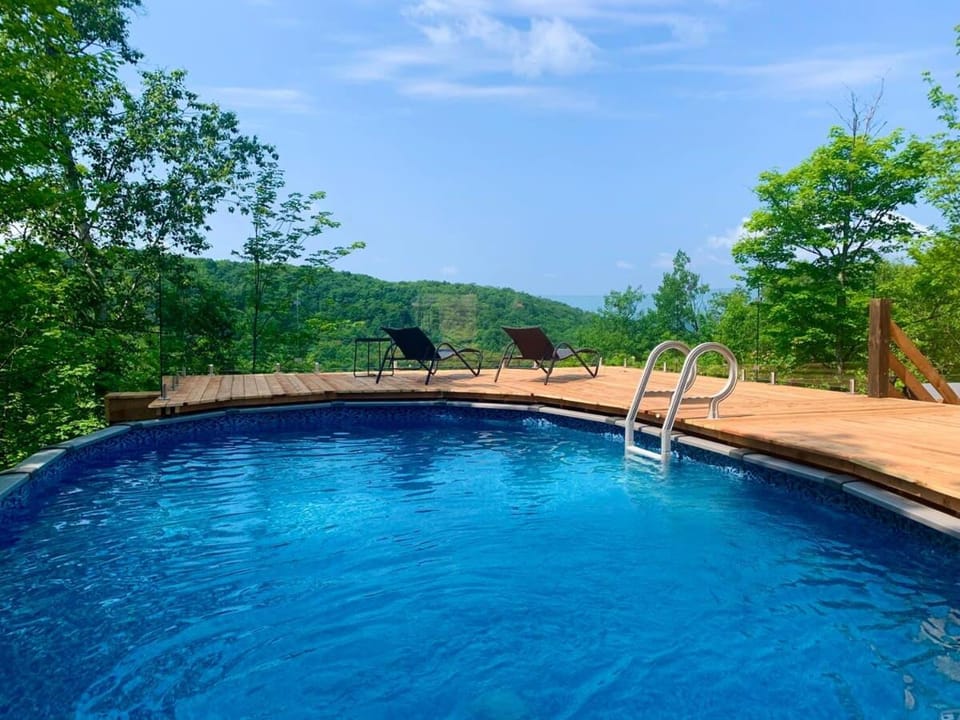 Blue Hill Pool spa game room mountain view Chalet in Morin-Heights