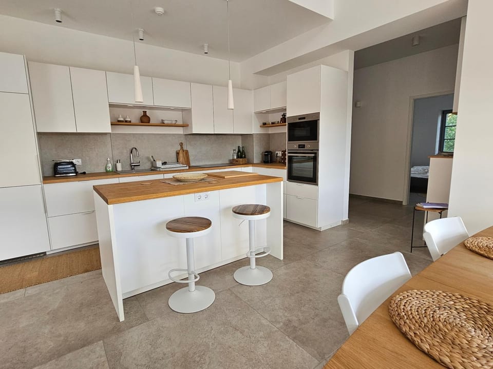 Kitchen or kitchenette, Dining area, dishwasher, oven, stove
