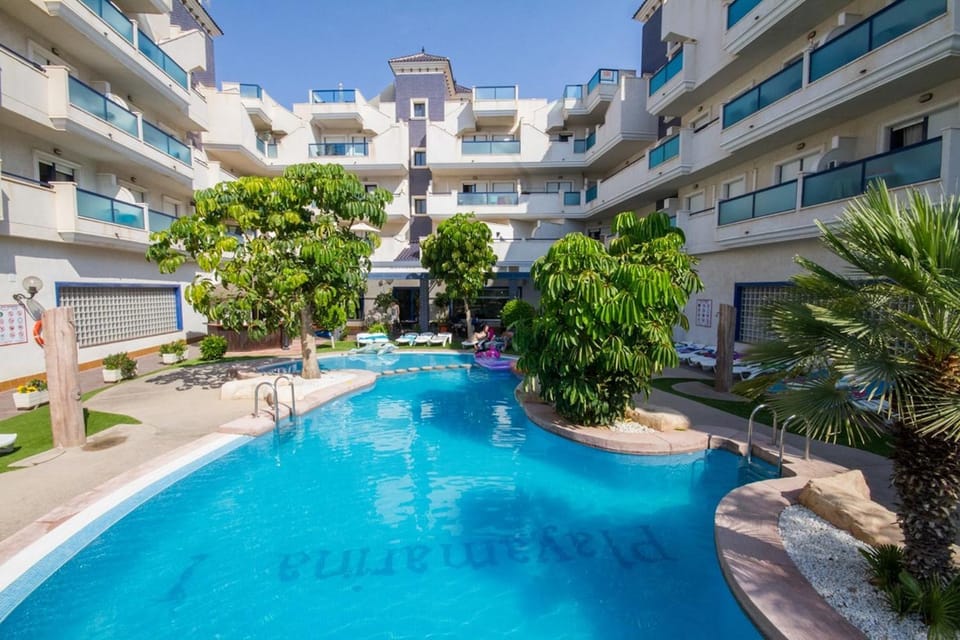 Property building, Day, Pool view, Swimming pool, sunbed