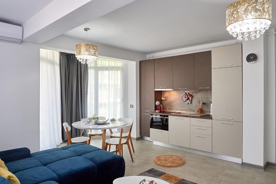 Kitchen or kitchenette, Living room, Seating area, Dining area, stove
