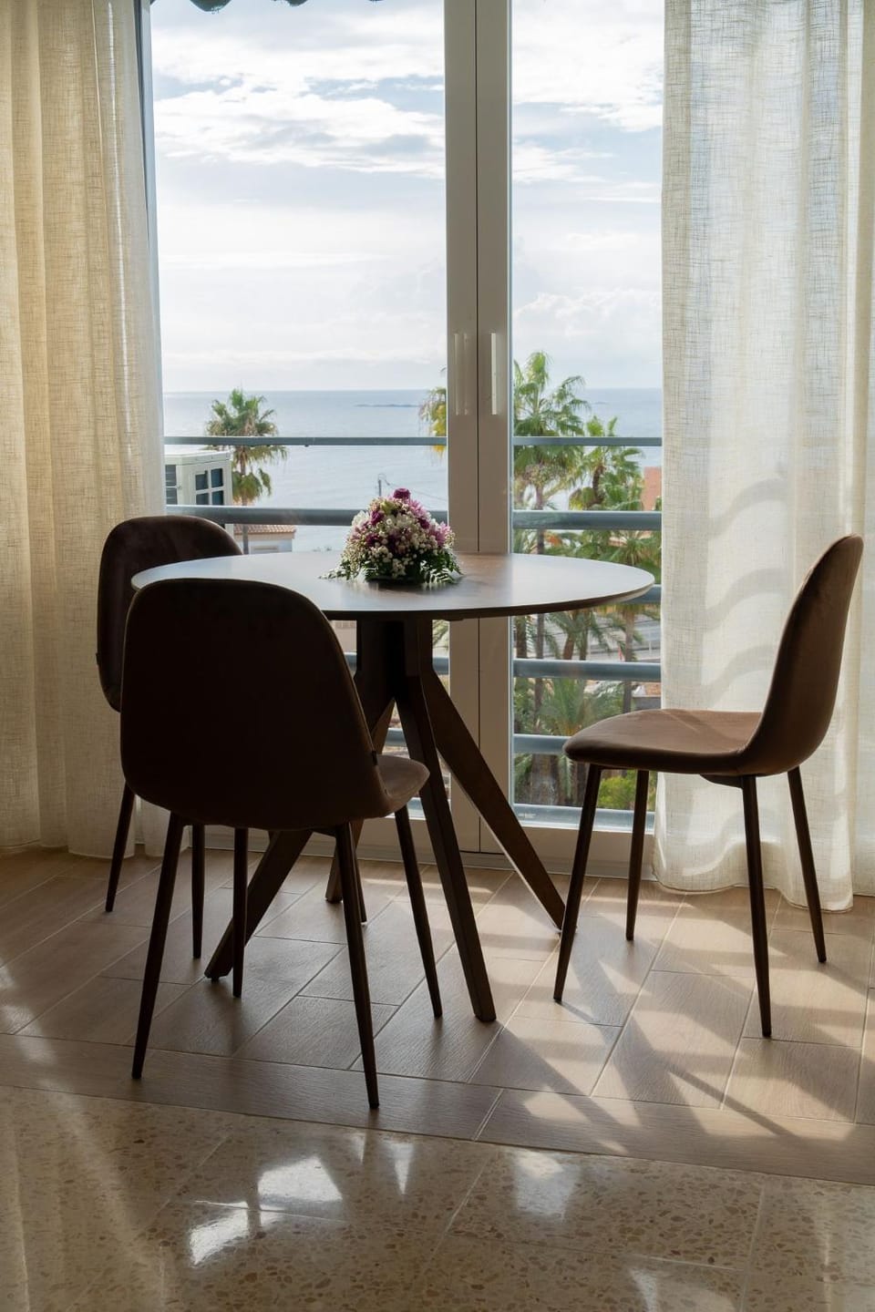Natural landscape, View (from property/room), Living room, Seating area, Dining area, Sea view