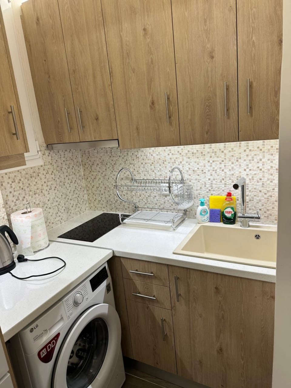 Kitchen or kitchenette, stove, washing machine