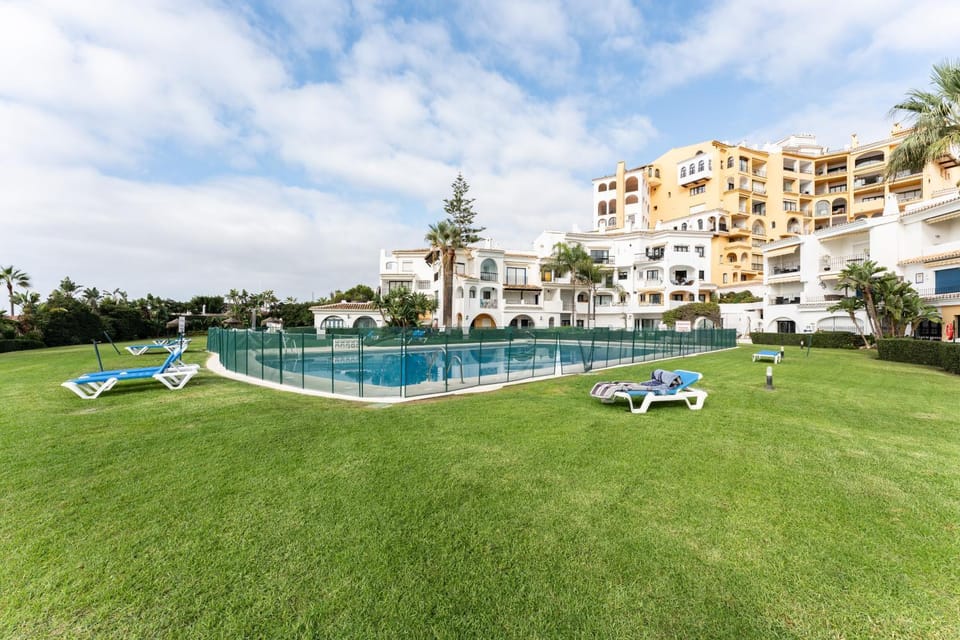 Property building, Living room, Swimming pool