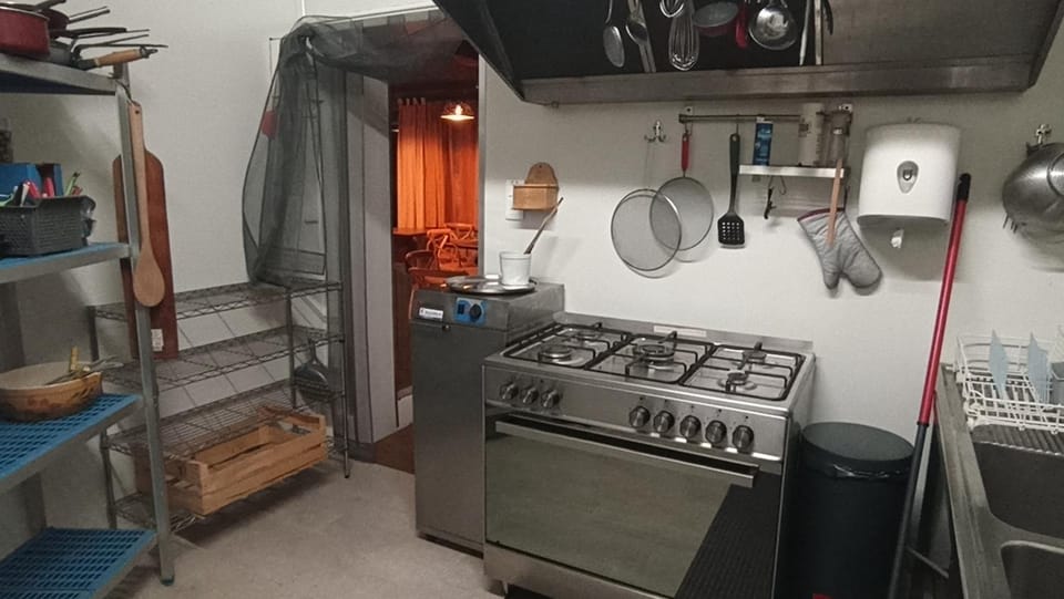 Kitchen or kitchenette, oven, stove, toaster
