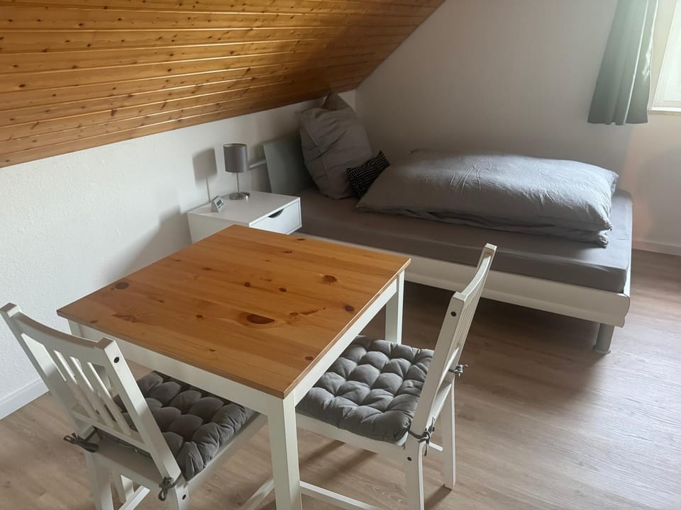 Bed, Seating area, Dining area, Bedroom