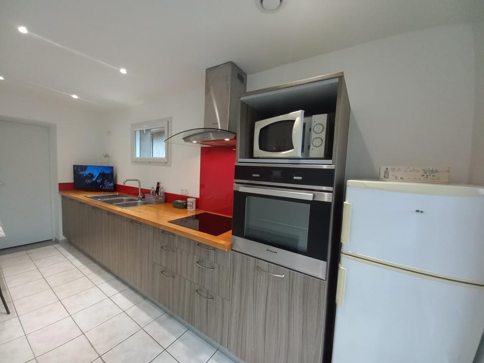 Kitchen or kitchenette, oven, stove, toaster