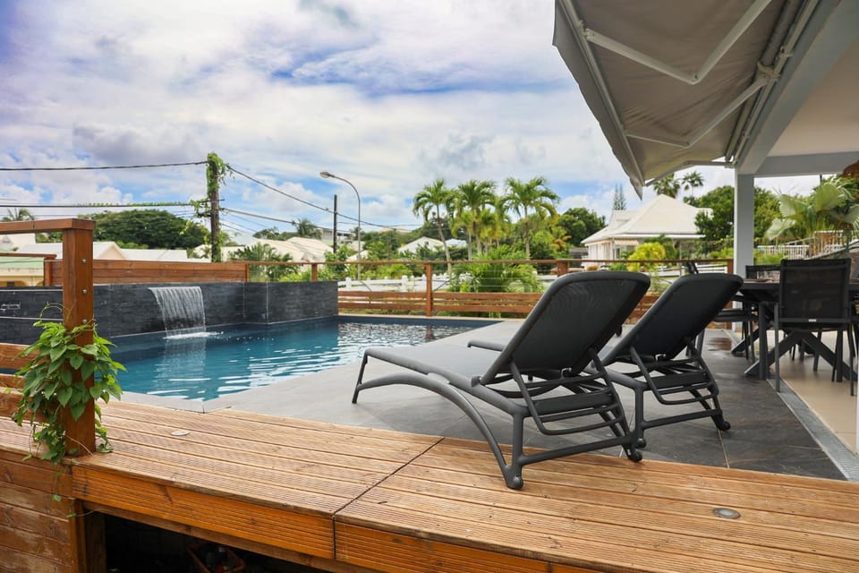 Patio, Natural landscape, Pool view, Swimming pool, sunbed