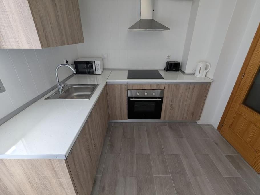 Kitchen or kitchenette, oven, stove, toaster
