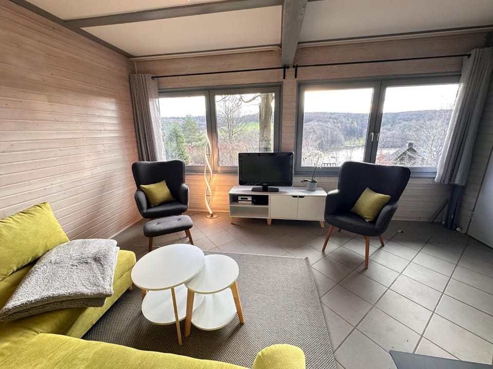 View (from property/room), View (from property/room), Living room, Seating area, Lake view, Lake view, Time of day