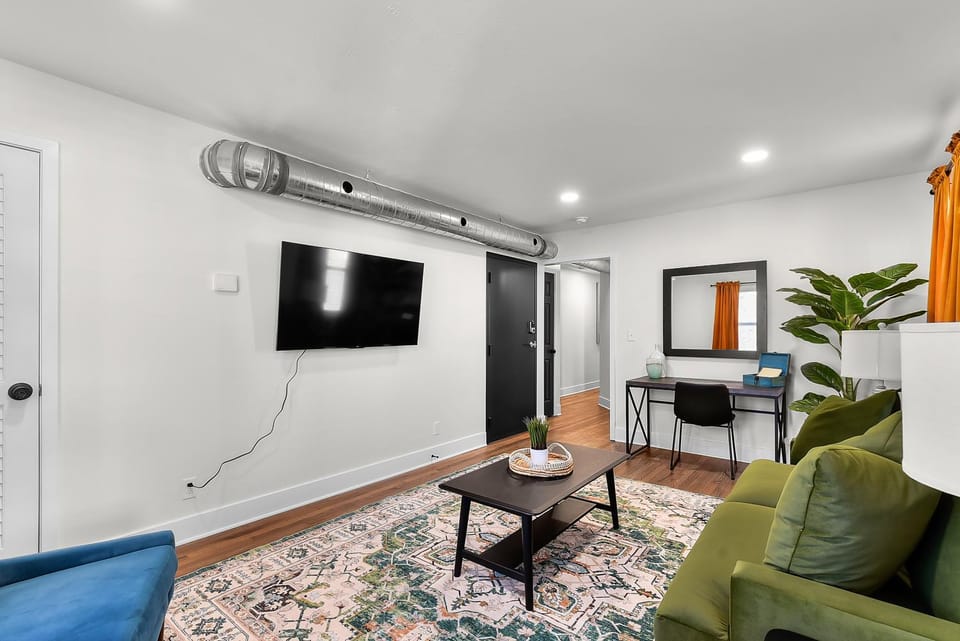 Retro Glam: Colorful Mid-Century Haven Apt 2 House in Omaha
