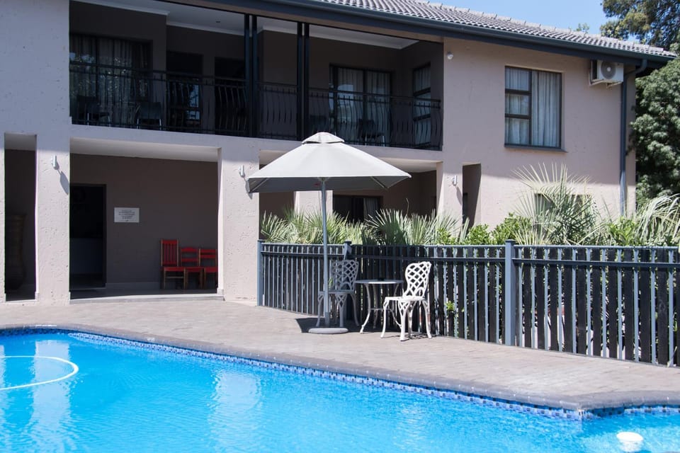 Property building, View (from property/room), Balcony/Terrace, Swimming pool